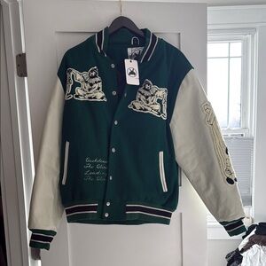 Basketcase Gallery Marionette Letterman Green